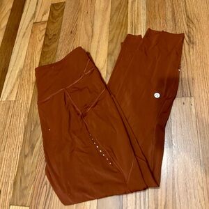 Lululemon dark burnt orange size large with side pockets worn a couple times